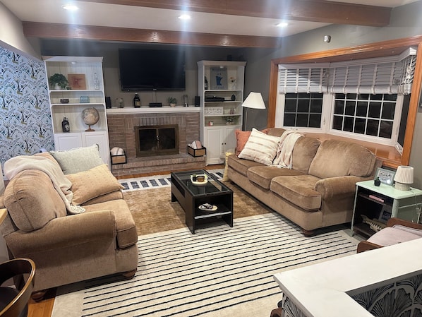 TV, DVD player, books, video library