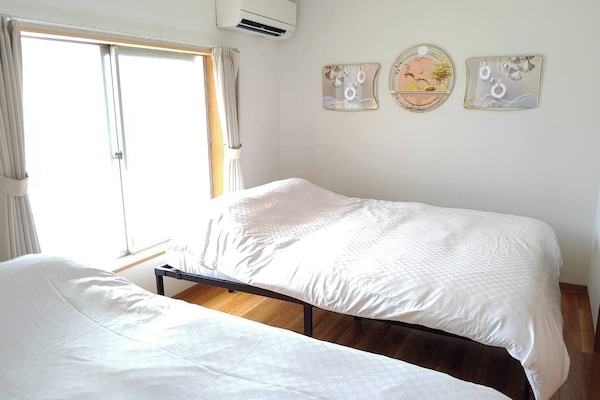 2 bedrooms, desk, iron/ironing board, travel crib