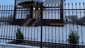 A hotel named Paradise Villa Hotel with a modern design, featuring a prominent entrance and a decorative fence. - Paradise Villa (Taldykorgan)