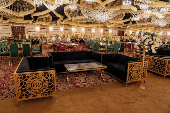A luxurious hotel lobby with ornate chandeliers, plush seating, and a patterned carpet. - PC Legacy Hyderabad (Hyderabad)