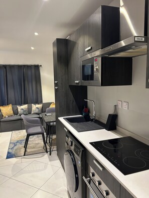 Studio, Balcony, City View | Private kitchen | Fridge, microwave, oven, dishwasher