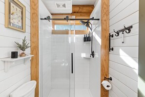 Hair dryer, towels, soap, shampoo