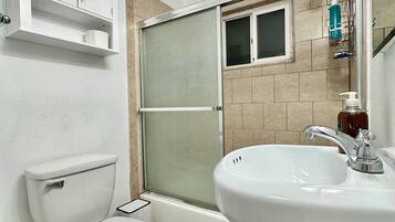 Hair dryer, towels, soap, shampoo