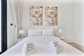 Exclusive Apartment, Balcony, City View | In-room safe, blackout curtains, soundproofing, iron/ironing board - PVH - Modern 1BR - Alexis Tower (Dubai)