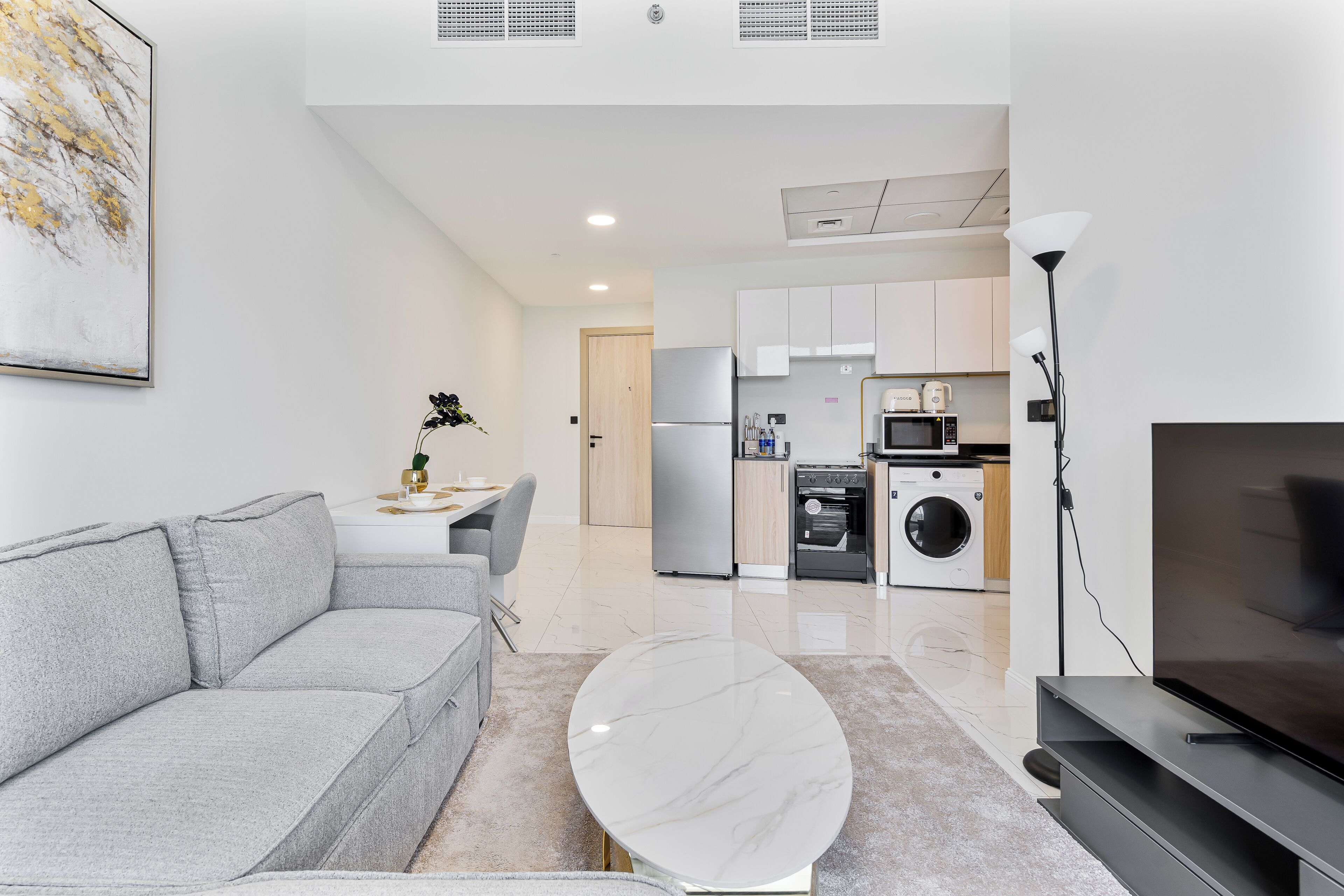 Exklusiv lägenhet - balkong - utsikt mot staden | Vardagsrum