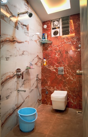 Bidet, towels, soap, toilet paper