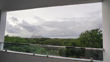 Family Apartment, Balcony, City View | In-room safe, desk, laptop workspace, blackout curtains