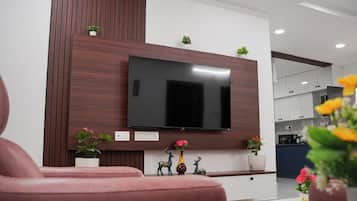 Family Apartment, Balcony, City View | Living area | Computer monitors, printers