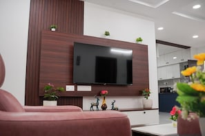 Familienapartment, Balkon, Stadtblick | Wohnbereich