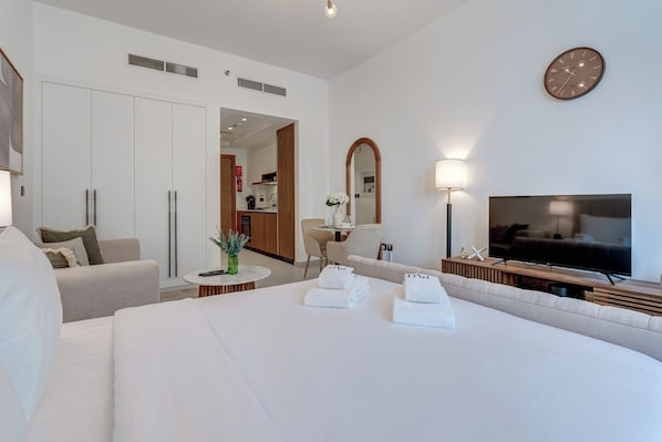 Exclusive Studio, Balcony, Pool View | In-room safe, blackout drapes, soundproofing, iron/ironing board