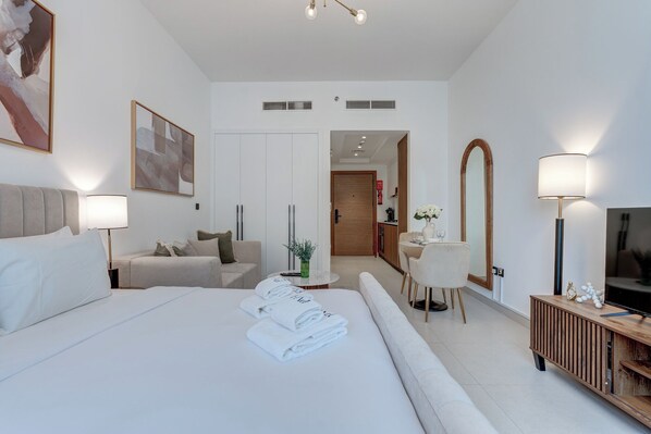 Exclusive Studio, Balcony, Pool View | In-room safe, blackout drapes, soundproofing, iron/ironing board