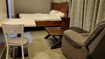 Habitación doble Deluxe, vista al jardín | Wifi gratis y ropa de cama