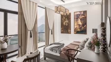 Suite, balkon, pemandangan gunung | Brankas dan Wi-Fi gratis