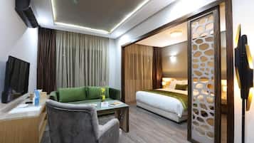 Deluxe Double Room, Balcony | In-room safe, iron/ironing board, free WiFi