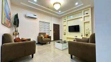 Family Apartment, Balcony, City View | Living area