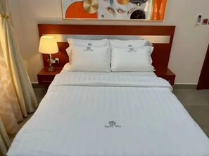 Family Apartment, Balcony, City View | Desk, laptop workspace, blackout drapes, soundproofing