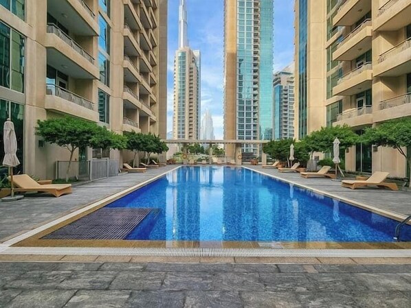 Outdoor pool - Downtown Balcony With Burj Khalifa View (Dubai)