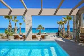 Outdoor pool - Sabbia Mare BeachFront Villa, steps from Dine&Shop (Heraklion)