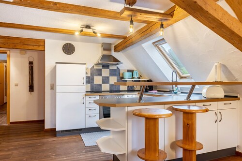 Apartment 'In the Attic' with Private Terrace, Shared Garden and Wi-Fi