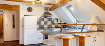 Apartment 'In the Attic' with Private Terrace, Shared Garden and Wi-Fi
