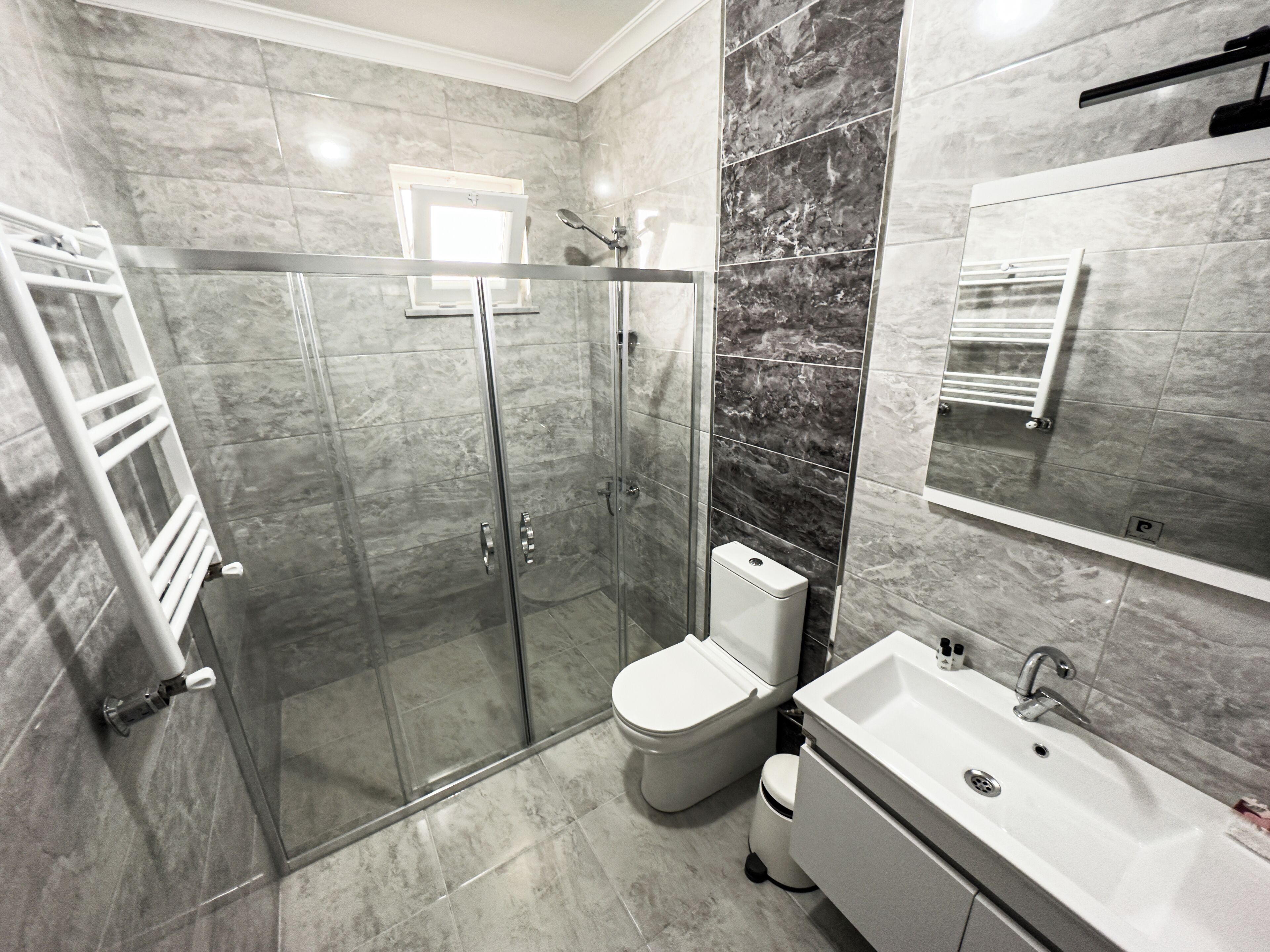 Shower, eco-friendly toiletries, hair dryer, towels
