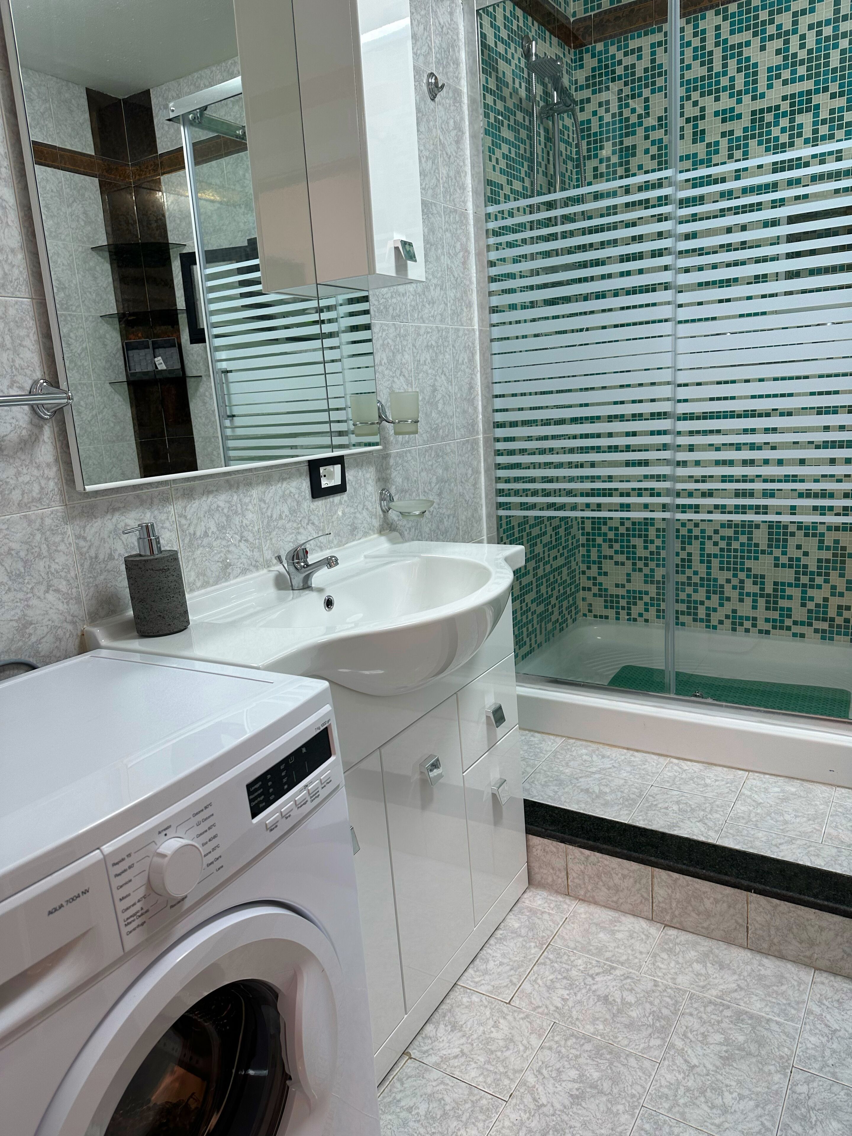 Eco-friendly toiletries, hair dryer, bidet, towels
