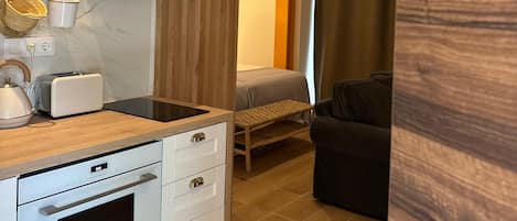 Apartamento básico, 2 camas de solteiro | Wi-Fi de cortesia