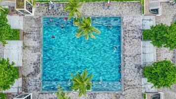 3 outdoor pools, open 7:00 AM to 7:00 PM, pool umbrellas, sun loungers