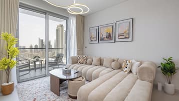 Luxury Apartment, 2 Bedrooms, Non Smoking, City View | Living area | 65-inch Smart TV with digital channels