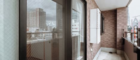 Family Suite, Balcony, City View | Desk, laptop workspace, free WiFi