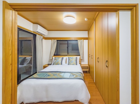 Family Suite, Balcony, City View | Desk, laptop workspace, free WiFi