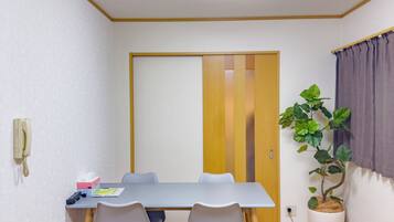 Family Suite, Balcony, City View | Desk, laptop workspace, free WiFi