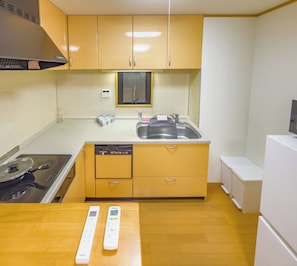 Family Suite, Balcony, City View | Desk, laptop workspace, free WiFi