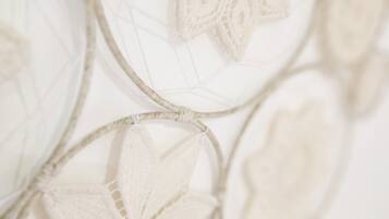 A close-up of a decorative item with lace patterns.