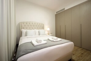 Apartment, Balcony, City View | Desk, laptop workspace, iron/ironing board, free WiFi