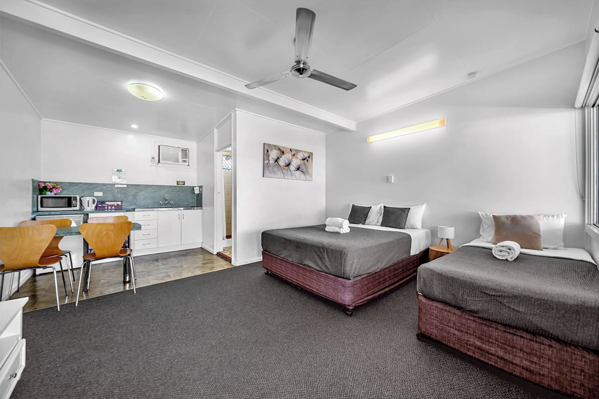 Desk, laptop workspace, free WiFi, bed sheets