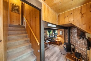 Smart TV, fireplace, DVD player, books