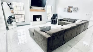 Smart TV, fireplace, books