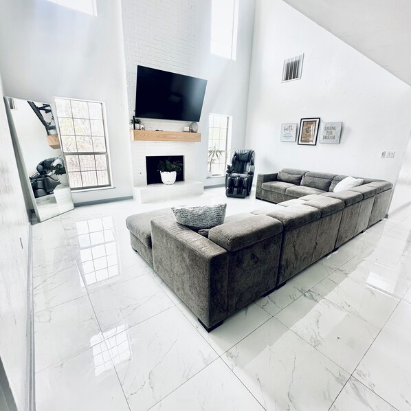 Smart TV, fireplace, books