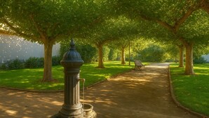 A pathway lined with trees and a bench, leading to a building.