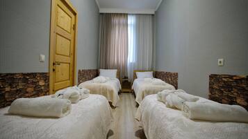 Quadruple Room, Garden View | In-room safe, iron/ironing board, free WiFi