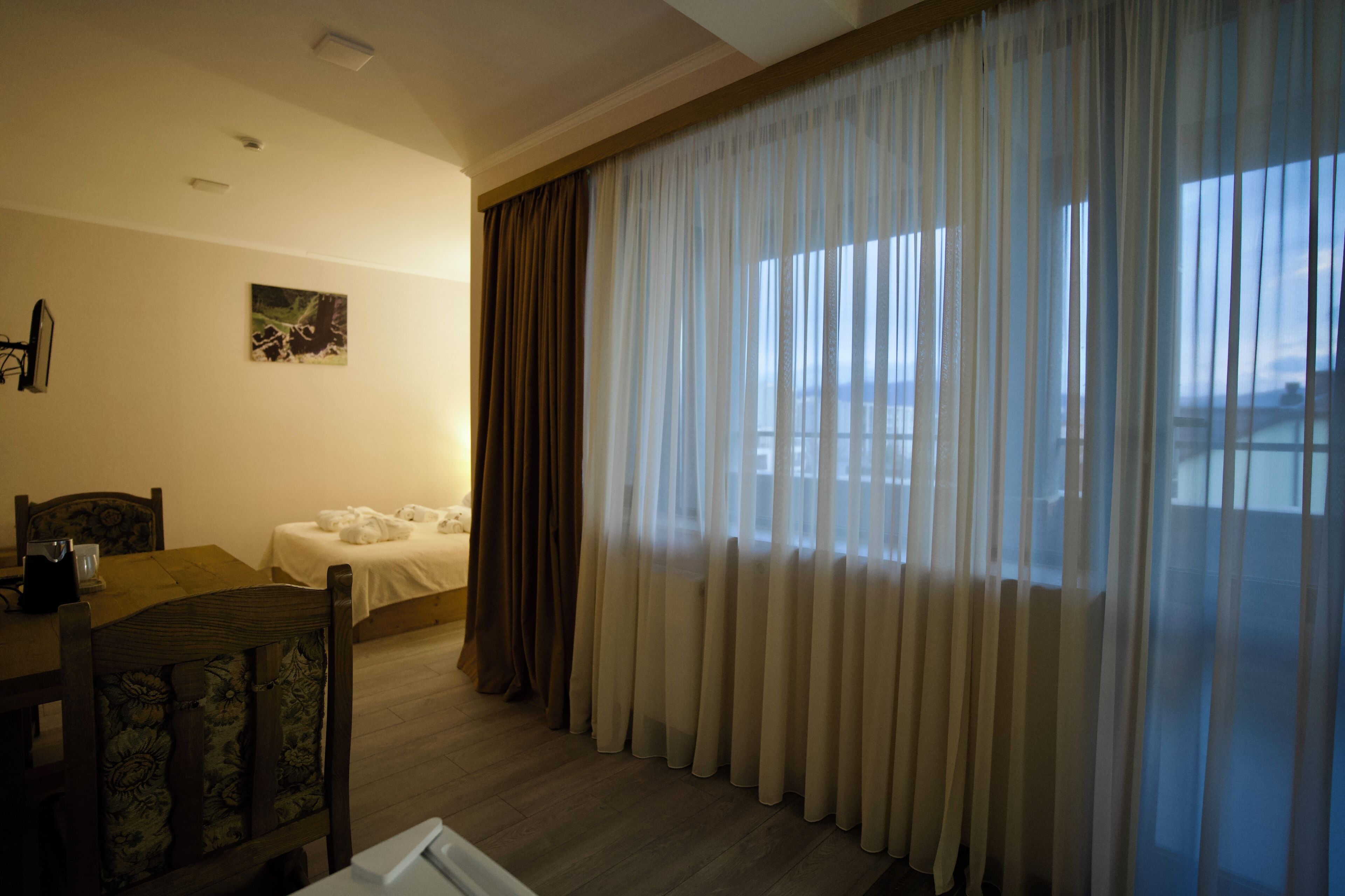 Triple Room, Balcony, Garden View | In-room safe, iron/ironing board, free WiFi