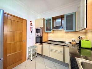 Microwave, coffee/tea maker, cookware/dishes/utensils