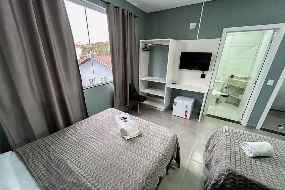 Standard Quadruple Room | Laptop workspace, free WiFi
