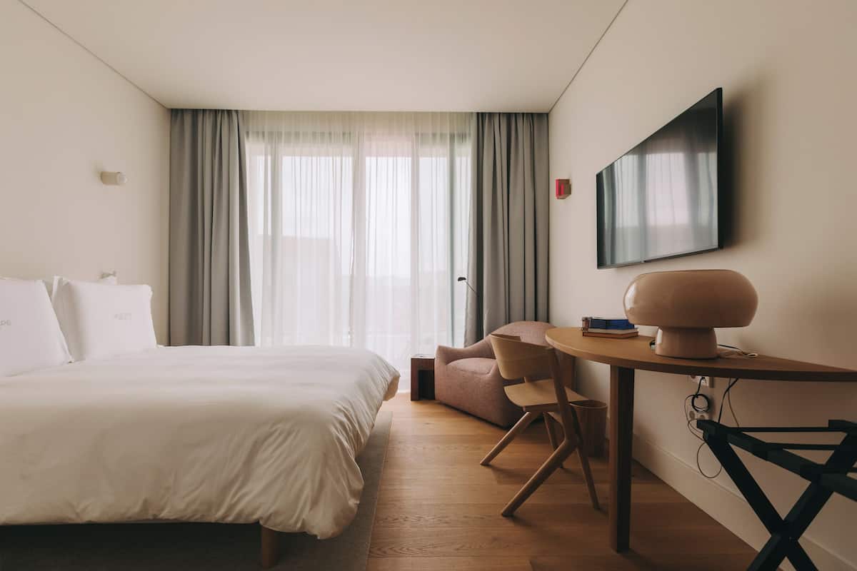 Executive with Balcony and View. | Minibar, in-room safe, individually decorated, desk