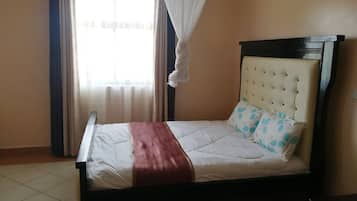 Habitación doble Deluxe, vista al jardín | Wifi gratis y ropa de cama