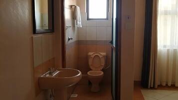 Deluxe Single Room, Garden View | Bathroom | Shower, slippers, towels, soap