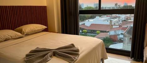 1 habitación, acceso a internet y ropa de cama