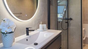 Shower, free toiletries, hair dryer, bathrobes