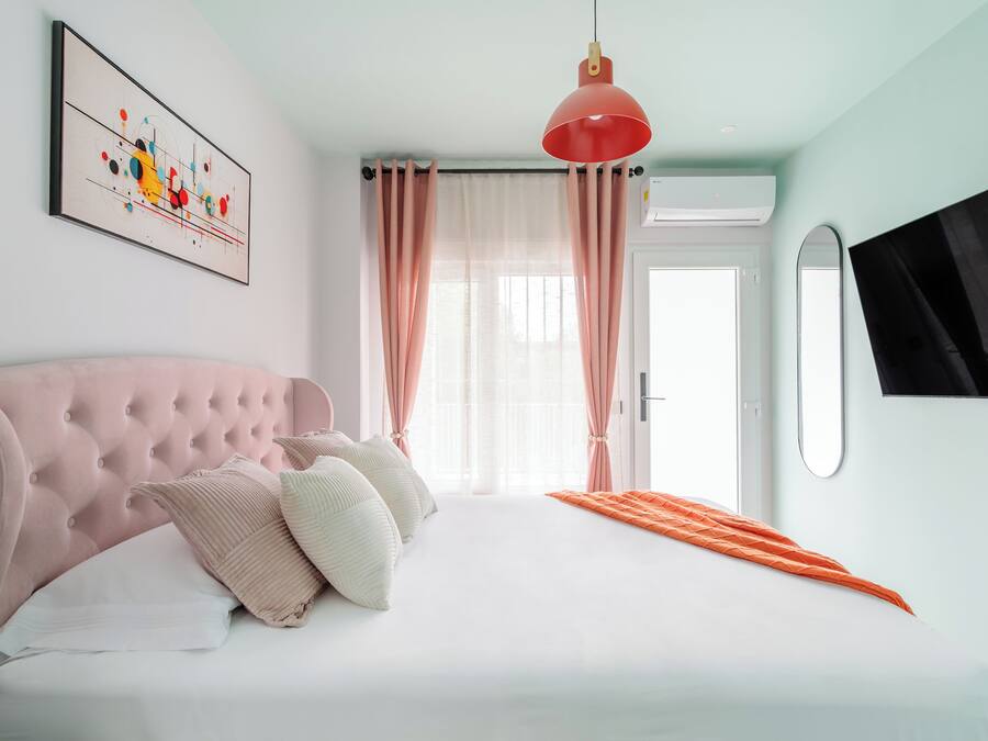 Free minibar items, in-room safe, laptop workspace, blackout curtains